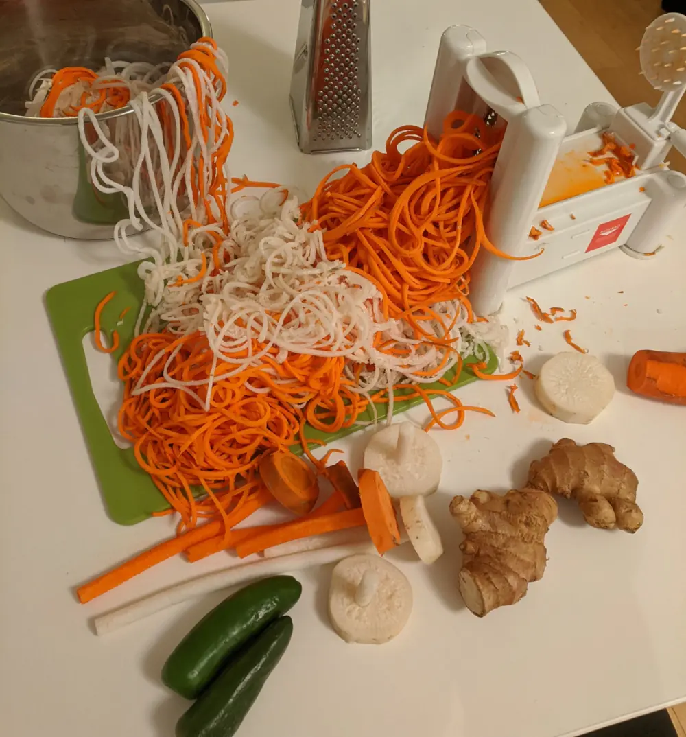Spiralizing the carrots & radish.